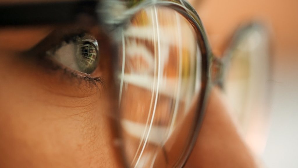 businesswoman researching nonprofit video production companies to market charity