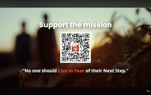 Inspirational sunset background with 'Support the mission' text, QR code, and red quote on living without fear – effective video fundraising screen from Tip of the Spear Landmine Removal's humanitarian demining campaign